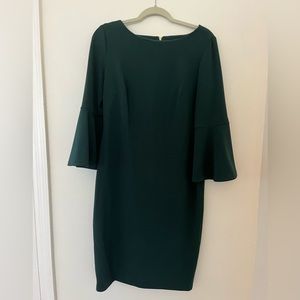 Calvin Klein emerald green cocktail dress with gold zipper. Size 12.